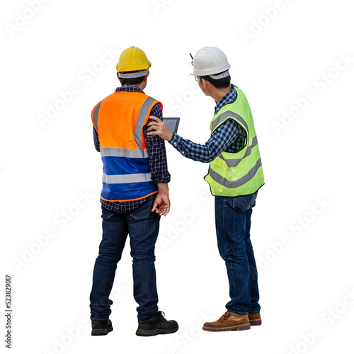 Engineer and foreman worker checking project at building site, Engineer and builders in hardhats discussing on construction site