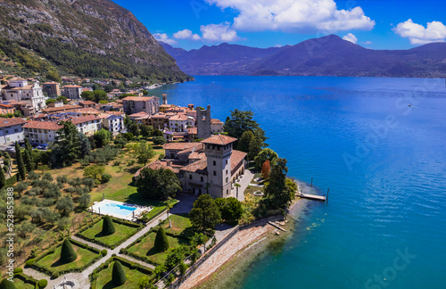 Romantic beautiful lake Iseo, aerial view of Predore idyllic village surrounded by mountains. Italy , Bergamo province
