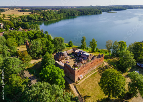 Stare Drawsko, Poland August 16 2022: Ruins of the Castle of the Templati Drahim on Lake Drawsko