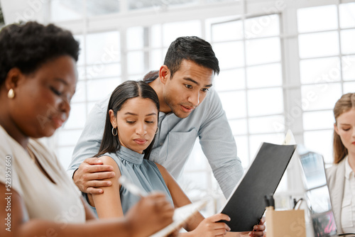 Sexual harassment or inappropriate touch by a businessman on a female employee by putting his hand on her. Unhappy and awkward female coworker feeling uncomfortable due to behavior in the office