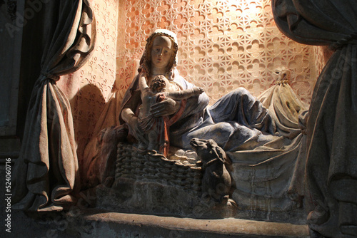 statue of madonna and child in a church (saint-martin-aux-champs) in metz (france)