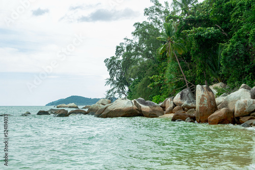 Rocky seaside scenery at Besar Island or Pulau Besar in Mersing, Johor, Malaysia