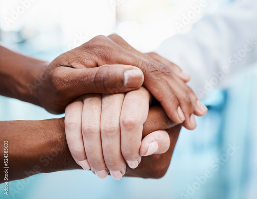 Hand holding for support, trust and empathy of couple, romantic love partners or reliable best friends closeup. A loving and caring friendship or relationship together in difficult loss and grief