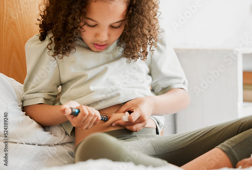 Diabetes, insulin and diabetic girl injecting treatment in her bedroom as a health morning routine at home. Medicine, house and testing to monitor blood sugar levels, wellness and medical healthcare