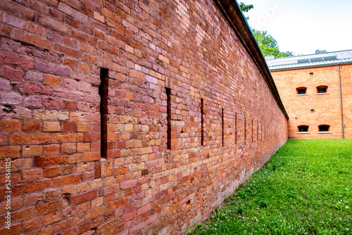 Tekstura ściany z cegły tła, zabytkowy budynek.