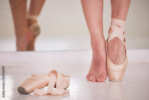 Closeup ballet feet, ballerina pointe shoes or dancer legs after dancing beautiful, classy or elegant stage choreography. Professional woman or theater artist performing creative dance studio routine