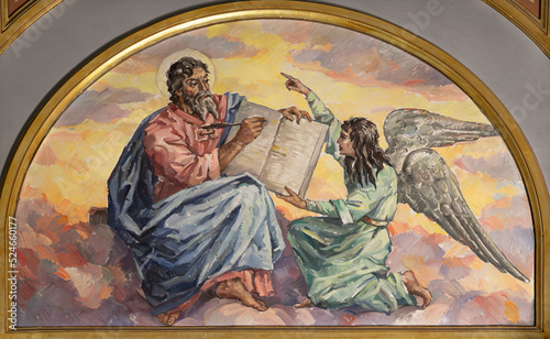 VALENCIA, SPAIN - FEBRUARY 17, 2022: The painting St. Matthew the Evangelist in church Iglesia El Buen Pastor by Miguel Vaguer (1959).