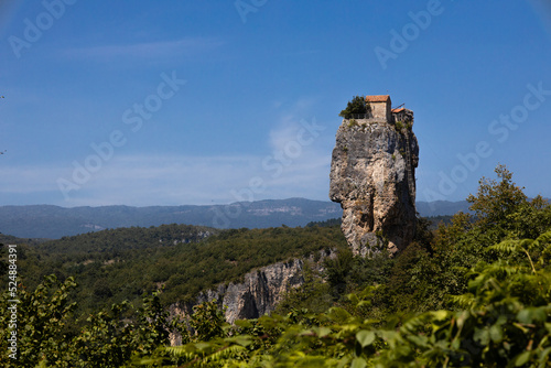 Katskhi pillar. Georgian landmarks. monastery near the village of Katskhi. extraordinary orthodox church and the abbot cell on a rocky cliff. Imereti, Georgia