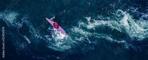 Extreme kayak boat rough river aerial top view, sunny day. Concept travel rafting adrenaline