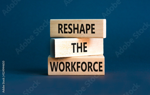 Reshape the workforce and support symbol. Concept words Reshape the workforce on wooden blocks. Beautiful grey table grey background. Business reshape the workforce quote concept. Copy space