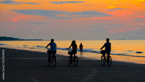 Sunrise photos at Burkes Beach on Hilton Head Island SC with family on bikes.