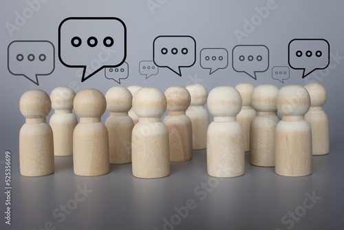 People figures with speech bubble. Social communication. Information exchange. Rumors and gossip. Talk and chat. Discussion and dialogue concept.