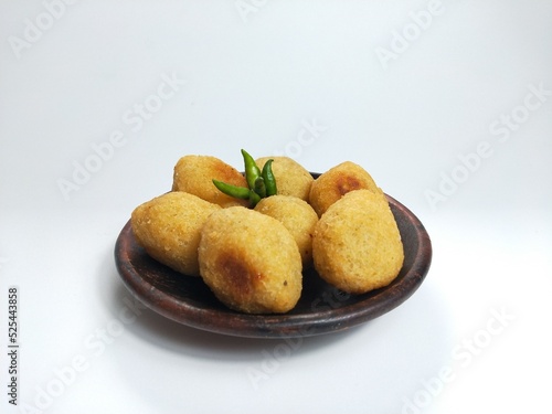 Comro or Combro is a typical Sundanese fried food, West Java, Indonesia. Comro or Combro is made from grated cassava which is shaped round or oval and filled with chili oncom and then fried.