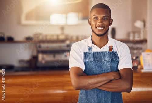 Cafe manager, coffee shop startup and waiter working in hospitality service food industry. Portrait of a happy, smile and proud small business entrepreneur with motivation for success in restaurant