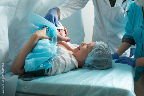 Mother look to her newborn baby in hospital