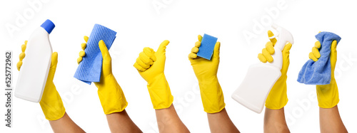 hand with yellow rubber glove holding cleaning supplies on transparent background