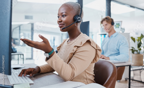 Call center, customer service and support with an agent working to help on a call online in her office. Contact us, telemarketing and consulting with a consultant in a headset giving helpful advice