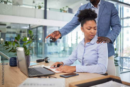 Workplace harassment, sexual abuse and unprofessional behavior from manager and business man touching a coworker in an office. Woman feeling uncomfortable, scared and worried about unwanted advances