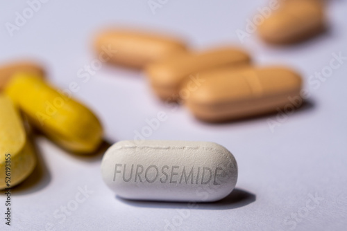 Furosemide blue pill tablet diuretic medication used to treat fluid build up due to heart failure liver scarring and kidney disease