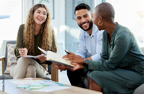 Happy business people smile during a planning meeting in a startup marketing agency office. Diversity, collaboration and teamwork in a healthy work environment in an international advertising company