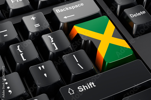 Jamaican flag painted on computer keyboard. Online business, education, shopping in Jamaica concept. 3D rendering