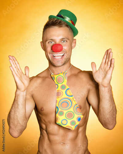 Young attractive clown. Handsome man.