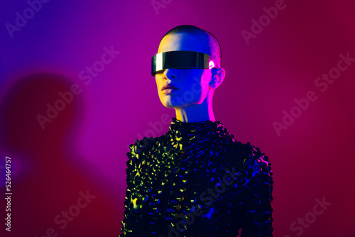 Beautiful woman with stylish clothes - Futuristic portrait of young female with colorful lighting, metaverse and creative fashion concepts