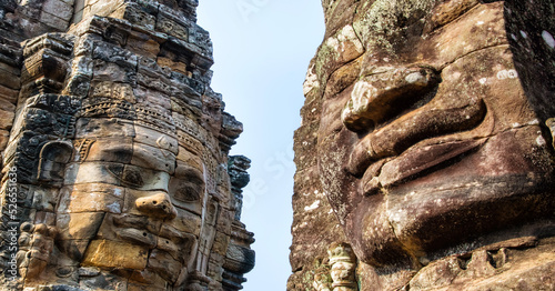 Stone murals and statue Bayon Temple Angkor Thom. Angkor Wat the largest religious monument in the world. Ancient Khmer architecture. Location: Siem Reap, Cambodia.