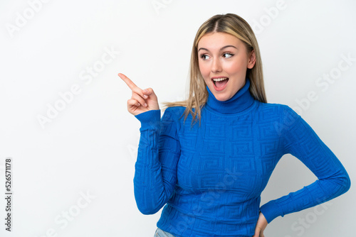 Young caucasian woman isolated on white background intending to realizes the solution while lifting a finger up