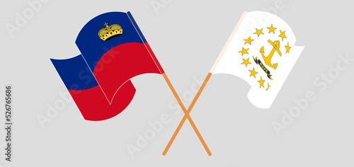 Crossed and waving flags of Liechtenstein and the State of Rhode Island