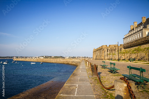 Saint-Malo lighthouse and pier view from the city fortifications, Brittany, France