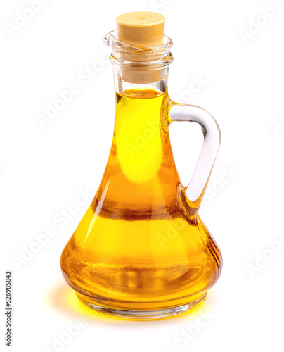 Sunflower, linseed, mustard, hemp or rapeseed oil in glass jug isolated on white background. Fresh yellow vegetable oil in glass jug.