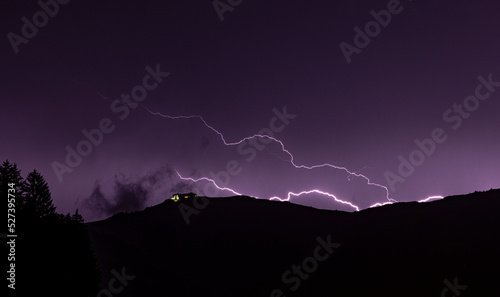 Zell am See, Austria, August 2022, lightning during a storm over the summit of the Schmittenhohe 