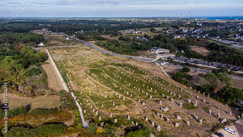 Aerial view of the Carnac stone alignments of Ménec in Morbihan, France - Prehistoric menhirs and megaliths in rows in Brittany