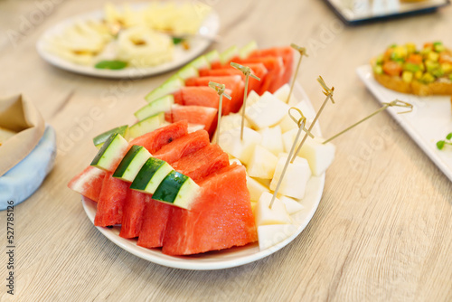 chopped melon and watermelon. catering for the holiday. buffet menu.