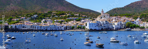 Panoramic of the coast of Catalonia with the picturesque village of Cadaques with its white houses on the edge of the sea, Spain.