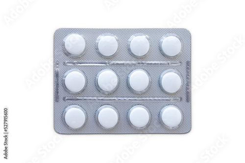 Medical blister packs with pills isolated on white.