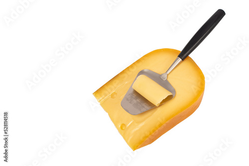 Piece of Cheese and cheese knife slicer isolated on white background, isolated