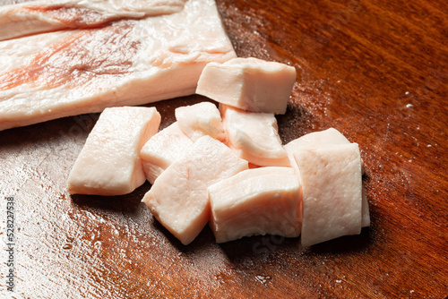 Fresh pork suet on chopping board