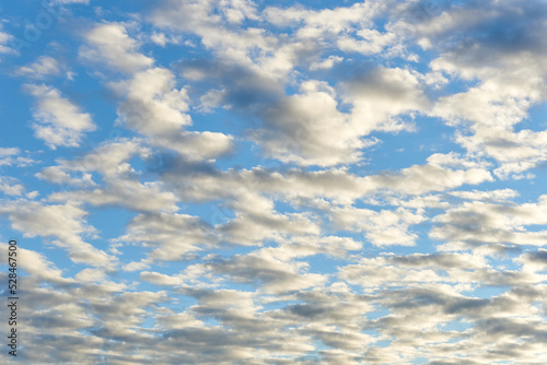 blue sky with altocumulus clouds