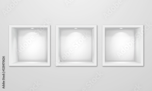 Empty square niche shelves with lighting in the wall. Vector 3d illustration.