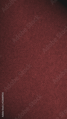 Dark red colored paper texture. Vertical brown tinted background. Mobile phone wallpaper. Textured surface, fibers and irregularities are visible. Vignetting