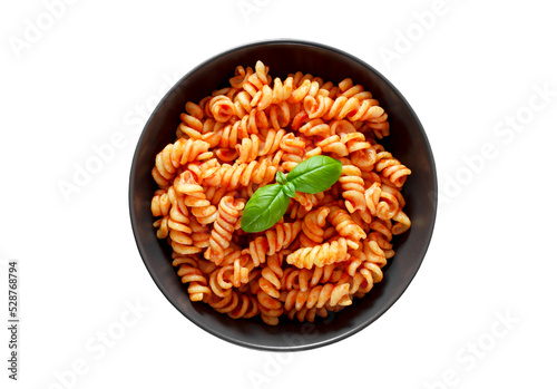 Fusilli pasta cooked with tomatoes sauce and basil isolated on white background with clipping path, top view.