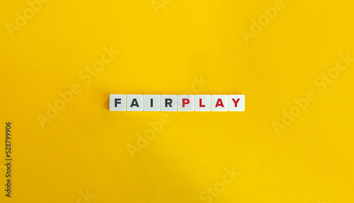 Fair Play Idiom on Block Letter Tiles on Yellow Background. Minimal Aesthetics.