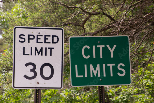 City limits and speed limit road signs 