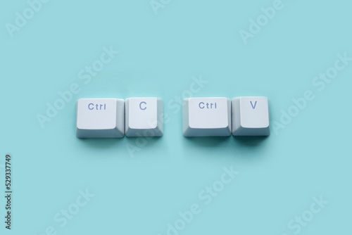 Ctrl C, Ctrl V keyboard buttons, copy and paste key shortcut isolated on a blue background.