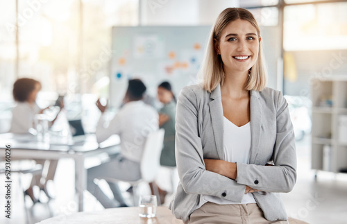 Portrait of girl leader or manager at a team planning, collaboration and strategy business meeting. Woman empowerment, leadership and management at a marketing office of a startup corporate company