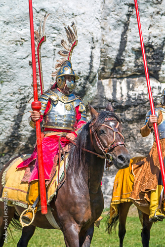 Knight in armor of hussar legion in Ogrodzieniec Castle