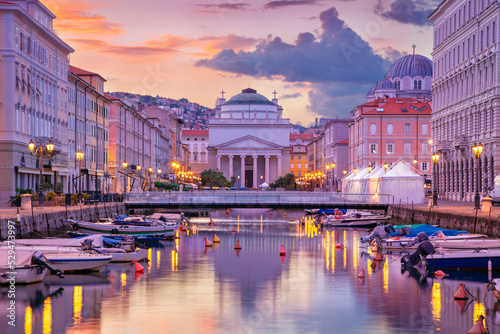 Trieste, Italy. Cityscape image of downtown Trieste, Italy at summer sunrise.