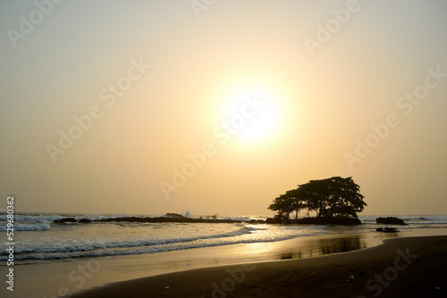 Dusty Sunset over the Atlantic Ocean on the Southern Shores of Bioko Island, Equatorial Guinea in Gran Caldera de Luba Scientific Reserve.